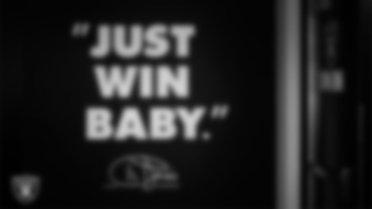 "Just Win Baby" signage in the locker room prior to the Raiders' arrival for their regular season home game against the Jacksonville Jaguars at Allegiant Stadium.