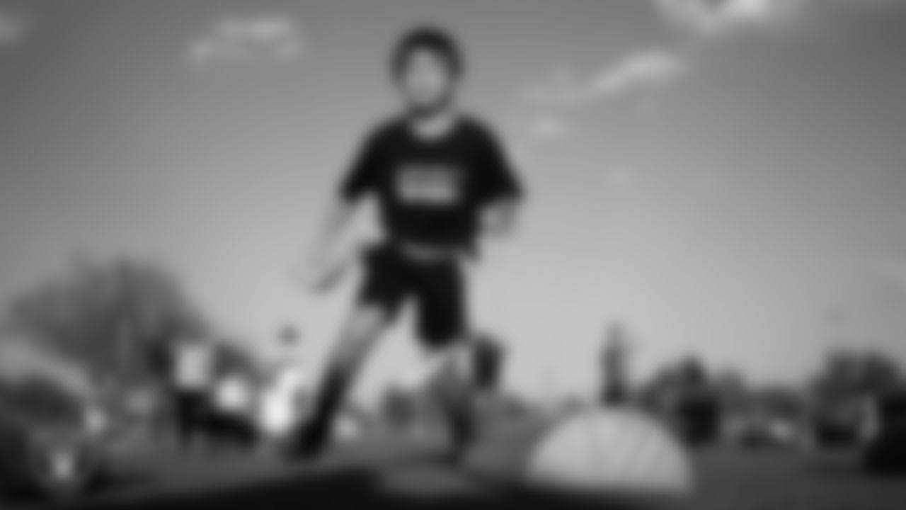 An athlete during a season kick off camp for the Silver and Black Flag Football League at Teton Trails Park.