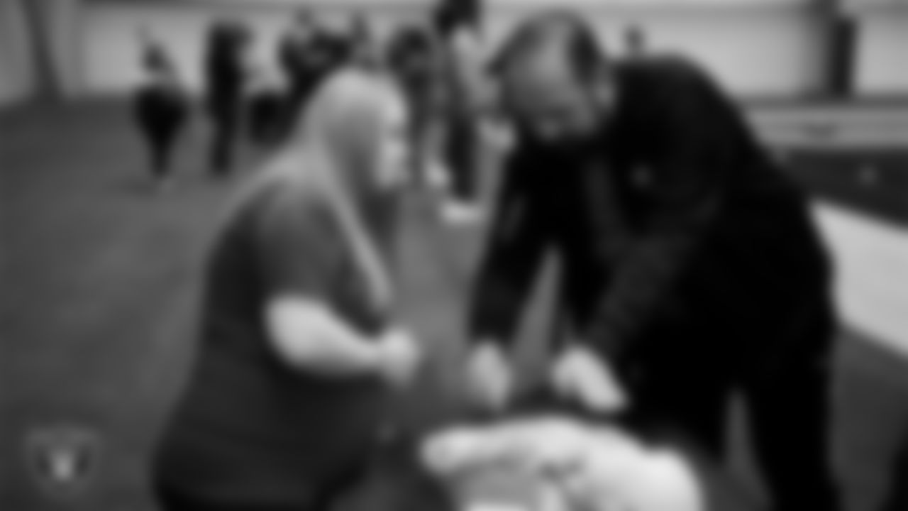 Attendees learn emergency response skills during an American Heart Health Month event at Intermountain Health Performance Center.