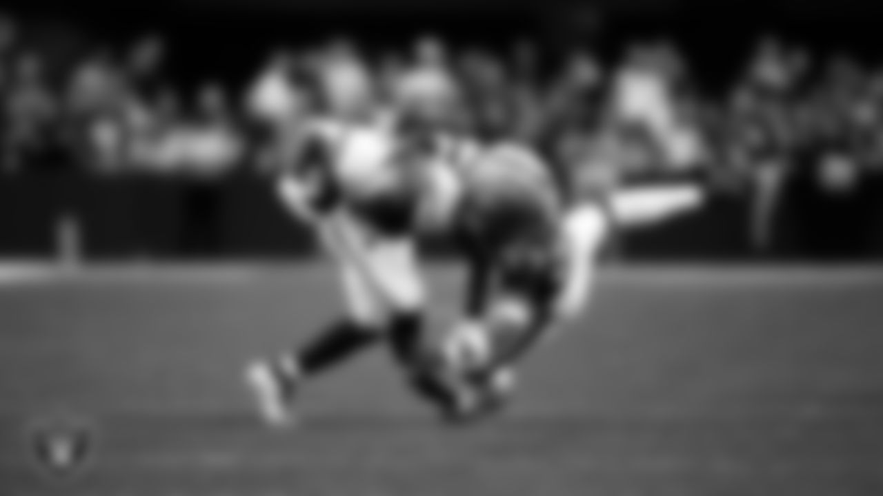 Las Vegas Raiders linebacker Jamal Adams (33) goes to make a tackle during the regular season home game against the Denver Broncos at Allegiant Stadium.