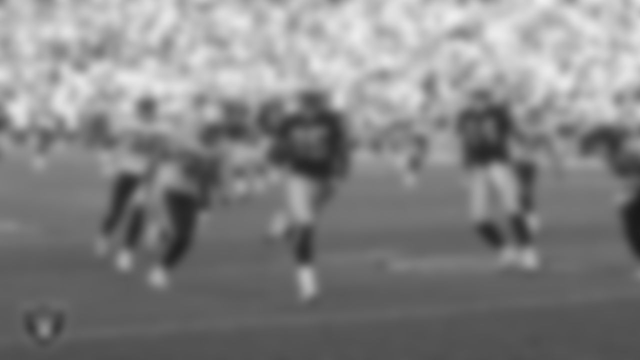 Oakland Raiders wide receiver Doug Gabriel (85) runs after making a 45-yard touchdown catch during the regular season home game against the Tennessee Titans at Network Associates Coliseum, Sunday, December 19, 2004, in Oakland, Calif.