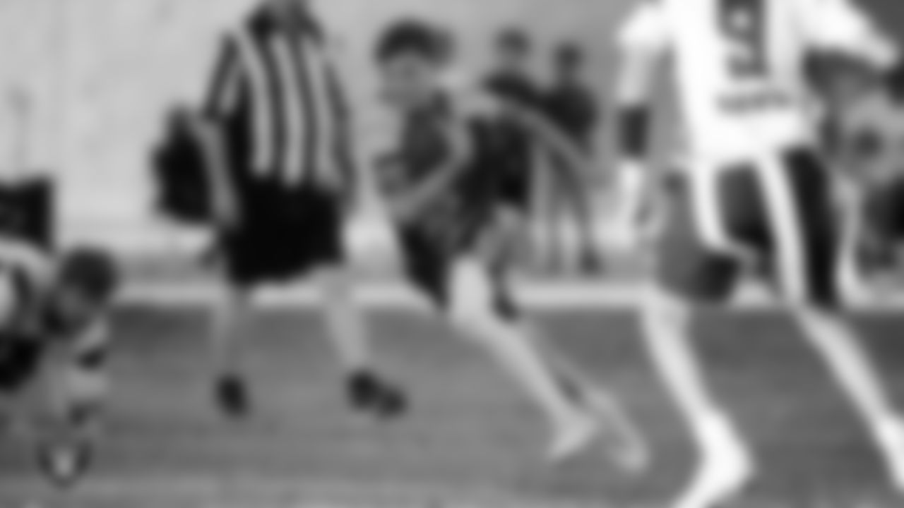 Ralph Cadwallader Middle School hosts Charles Hughes Middle School during the Las Vegas Raiders' Middle School Flag Football Showcase game at Ralph Cadwallader Middle School.