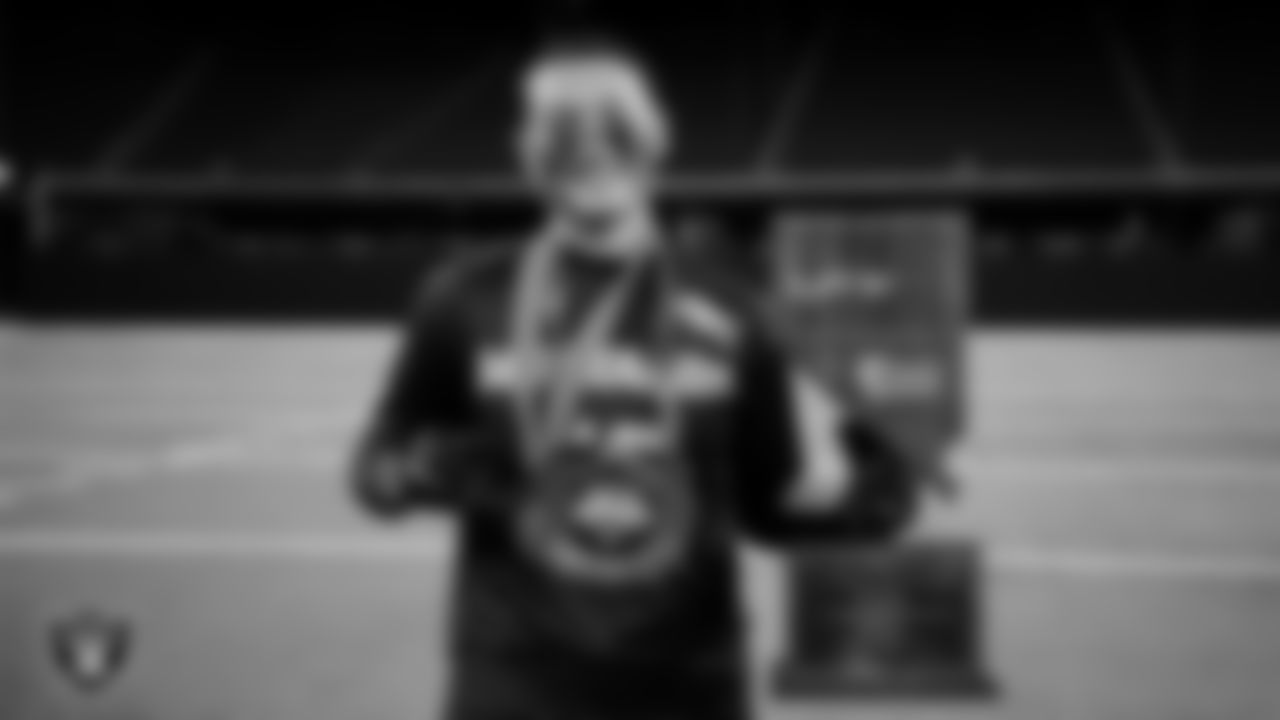 Shadow Ridge High School wide receiver and defensive back Jaylani Palmer poses for a photo with the MVP chain after the NIAA 5A Flag Football State Championship game at Allegiant Stadium.