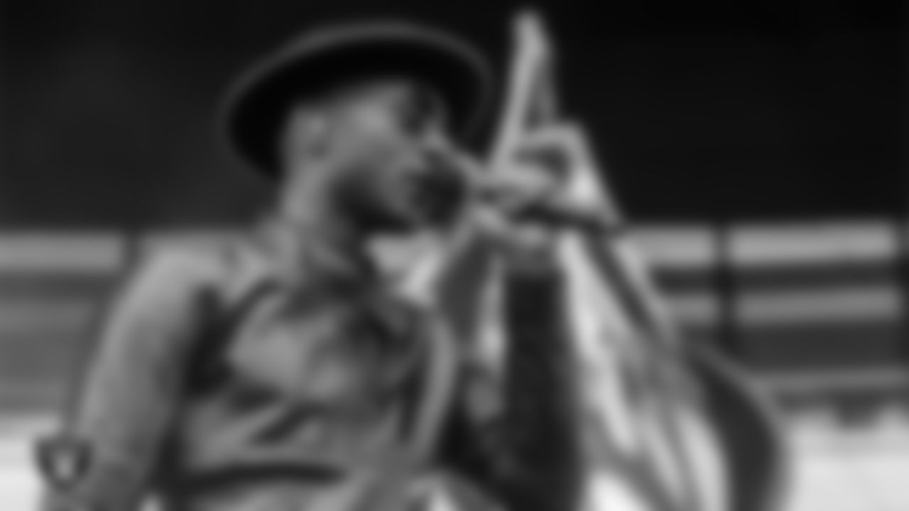 Singer Aloe Blacc performs with the Las Vegas Raiders' house band during halftime of the Raiders' regular season home game against the Tennessee Titans at Allegiant Stadium.