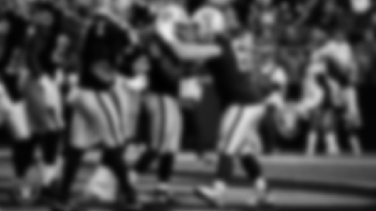 Las Vegas Raiders running back Ashton Jeanty (2) celebrates with center/guard Jordan Meredith (61) after rushing for a 3-yard touchdown during the regular season home game against the Tennessee Titans at Allegiant Stadium.