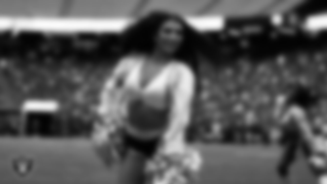 Raiderette Kylee performs on the field during a 2025 Training Camp mock game at Allegiant Stadium.