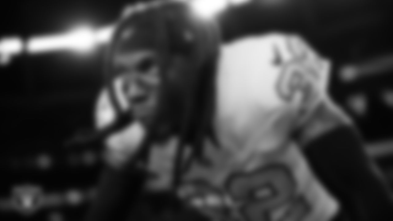 Las Vegas Raiders safety Lonnie Johnson Jr. (32) warming up before the regular season away game against the Denver Broncos at Empower Field at Mile High.