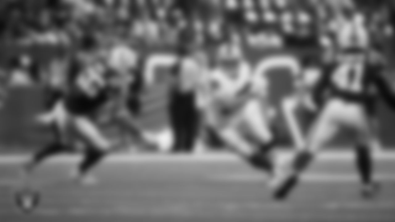 Las Vegas Raiders wide receiver Jack Bech (18) runs after making a catch during the regular season away game against the Indianapolis Colts at Lucas Oil Stadium.