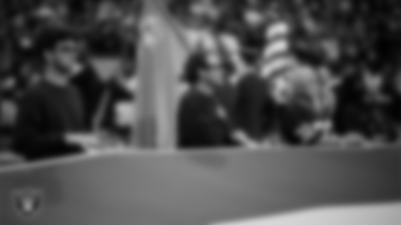 The American flag is displayed by Personal Seat License (PSL) holders on the field during the national anthem before the Las Vegas Raiders' regular season home game against the Kansas City Chiefs at Allegiant Stadium.