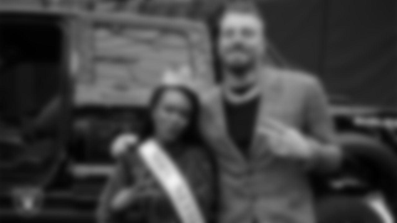 Mrs. Nevada-America Dr. Trudy Reese and defensive end Maxx Crosby (98) pose for a photo during the second annual Silver and Black Gala hosted by The Raiders Foundation at Allegiant Stadium.