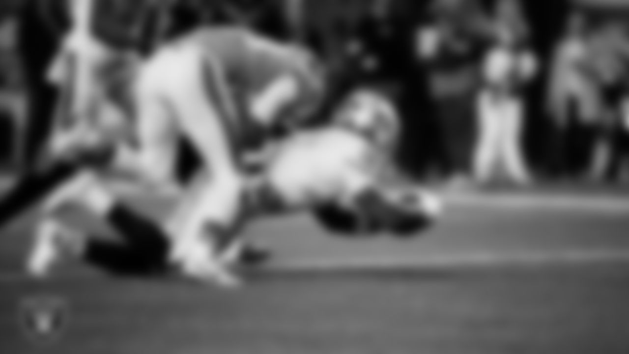 Las Vegas Raiders running back Ashton Jeanty (2) rushes for a 4-yard touchdown during the regular season away game against the Denver Broncos at Empower Field at Mile High.