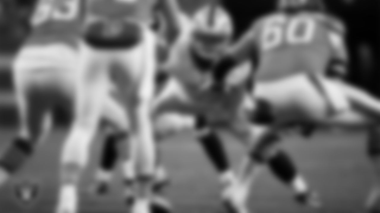 Las Vegas Raiders defensive tackle Adam Butler (69) defends during the regular season away game against the Denver Broncos at Empower Field at Mile High.