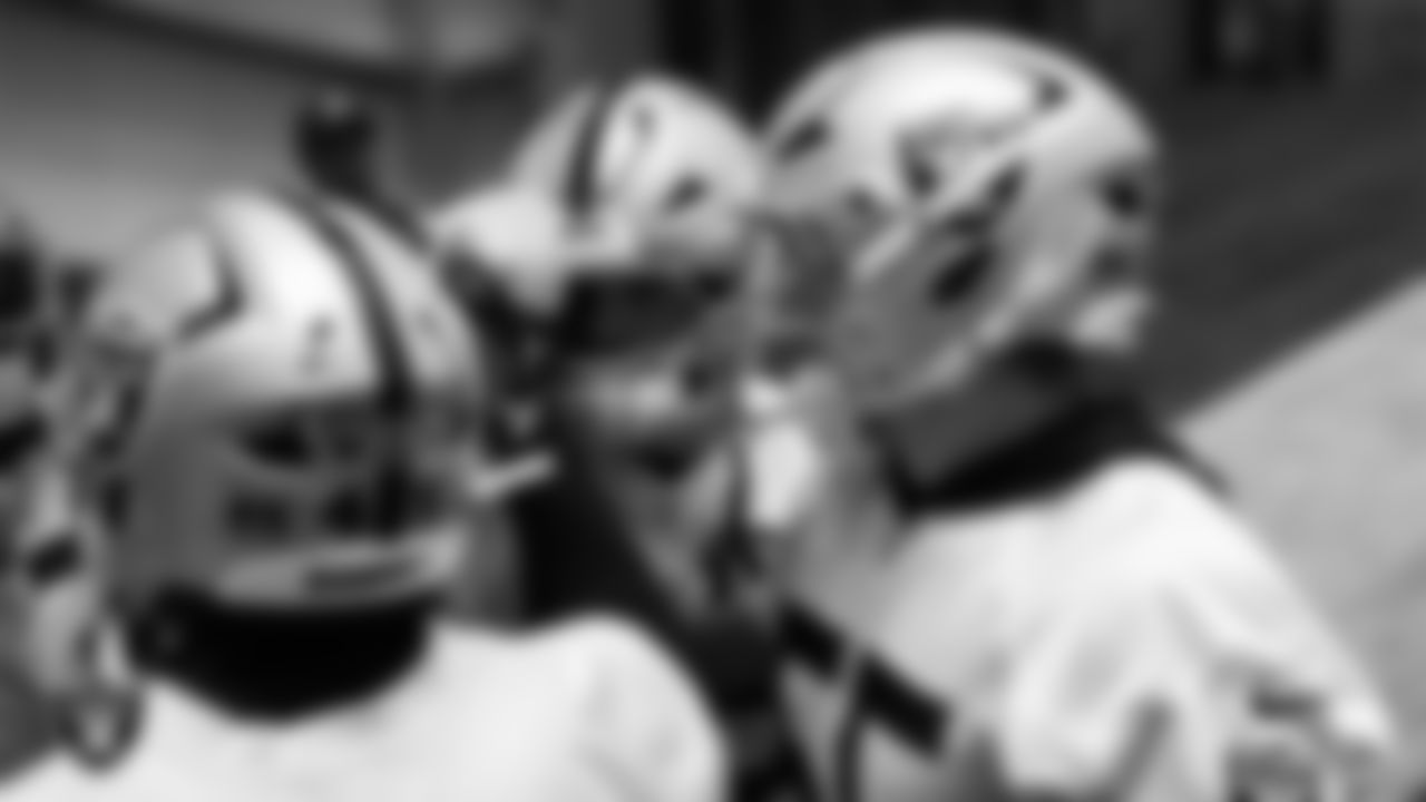 The Las Vegas Raiders linebackers huddle during practice at Intermountain Health Performance Center.