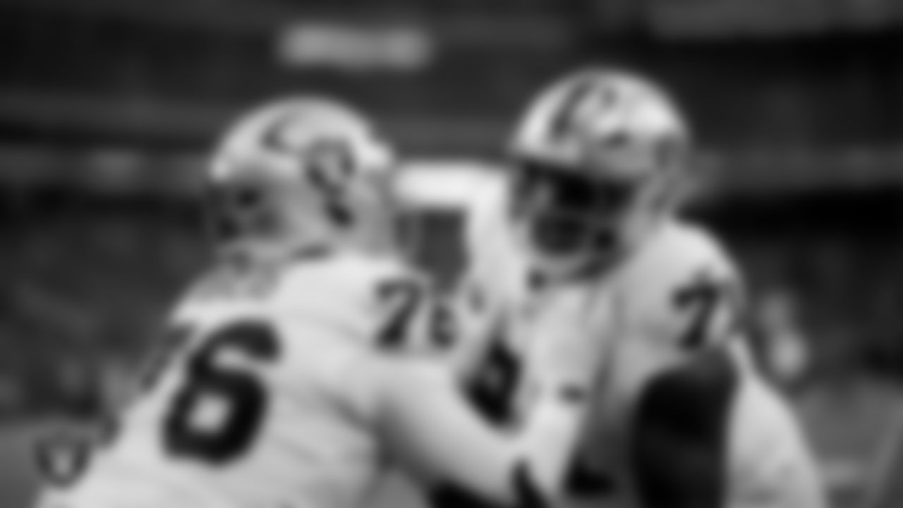 Las Vegas Raiders guard Caleb Rogers (76) and tackle DJ Glaze (71) warming up before the regular season away game against the Houston Texans at NRG Stadium.