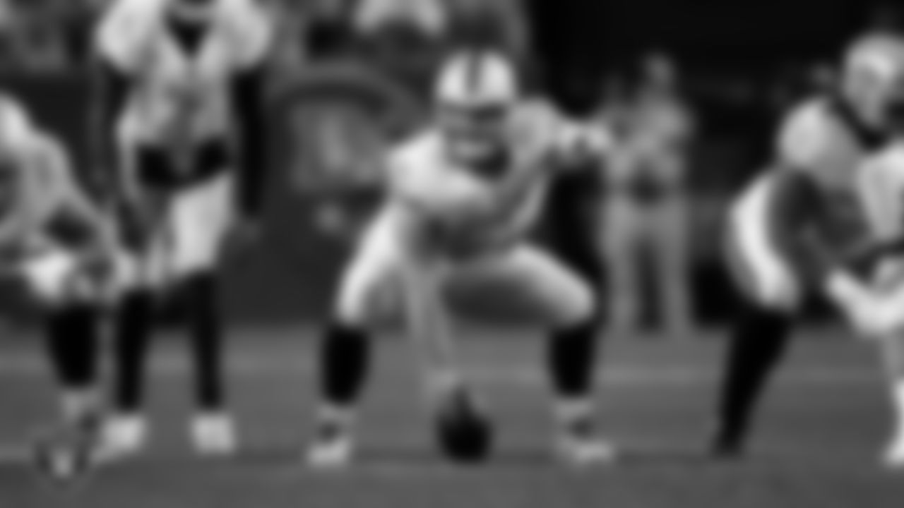 Las Vegas Raiders center/guard Jordan Meredith (61) lines up before the snap during the regular season away game against the Denver Broncos at Empower Field at Mile High.