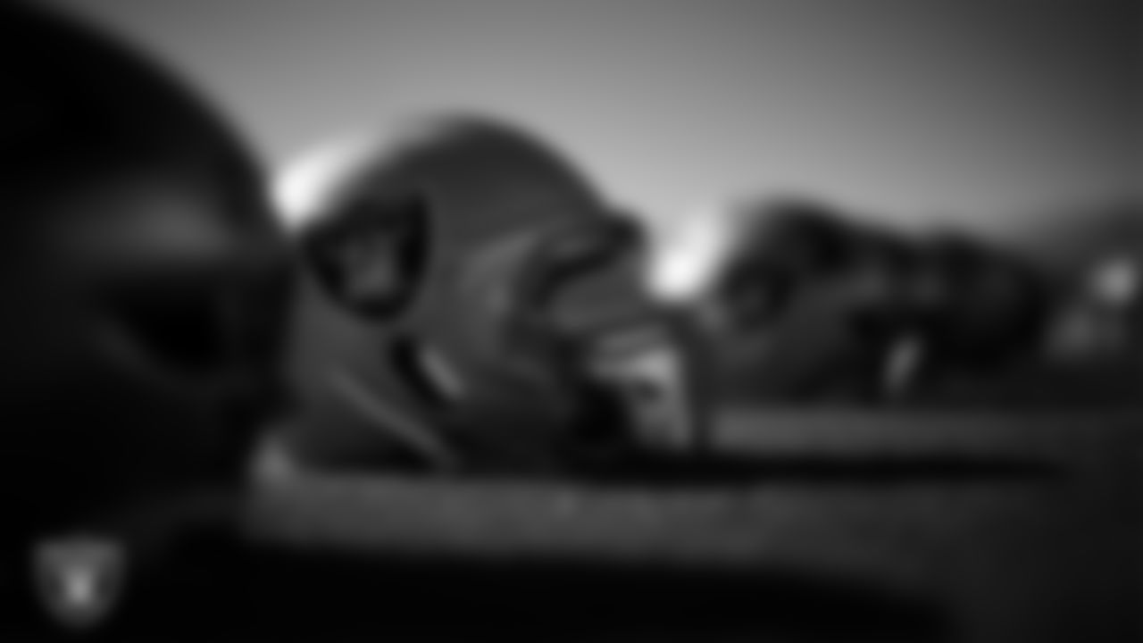 A Las Vegas Raiders helmet on the field during practice at Intermountain Health Performance Center.