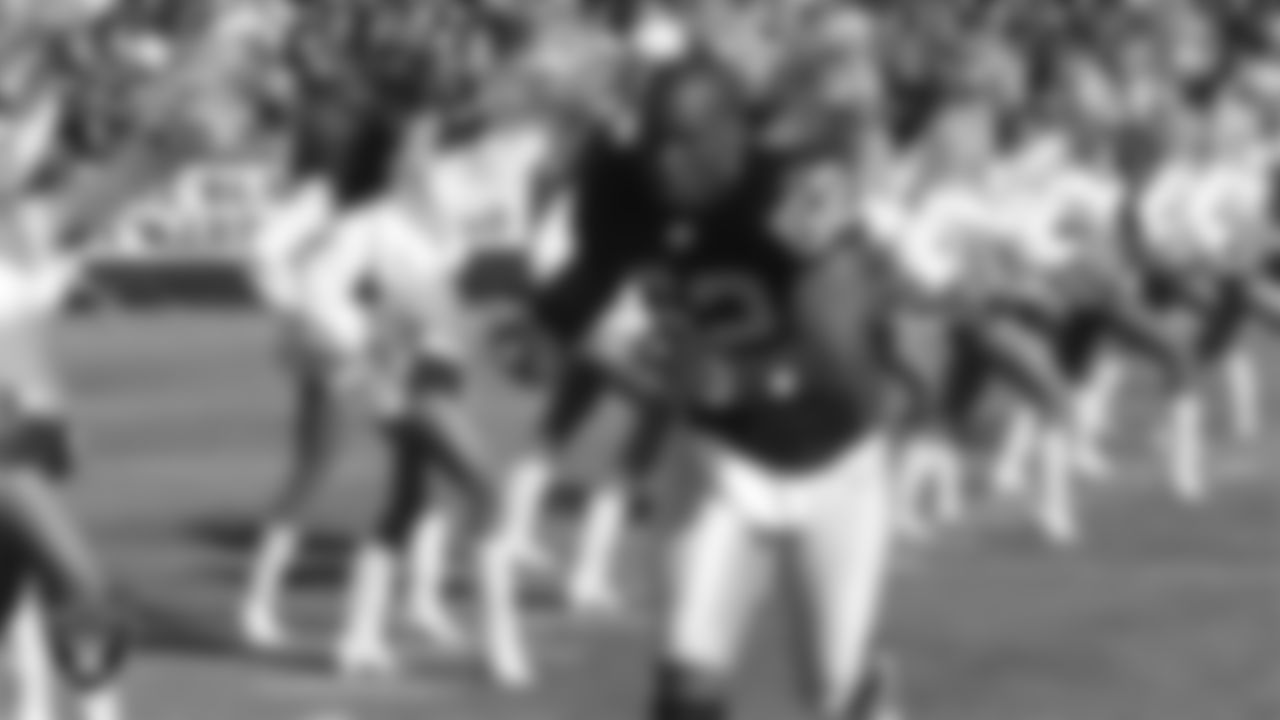 Oakland Raiders linebacker Kirk Morrison (52) is introduced onto the field before the preseason home game against the San Francisco 49ers at McAfee Coliseum, Sunday, August 20, 2006, in Oakland, Calif.