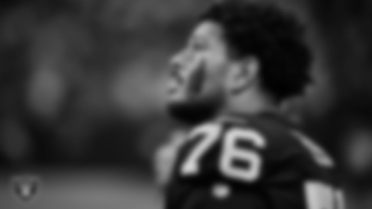 Las Vegas Raiders guard Caleb Rogers (76) on the sidelines during the regular season home game against the Cleveland Browns at Allegiant Stadium.