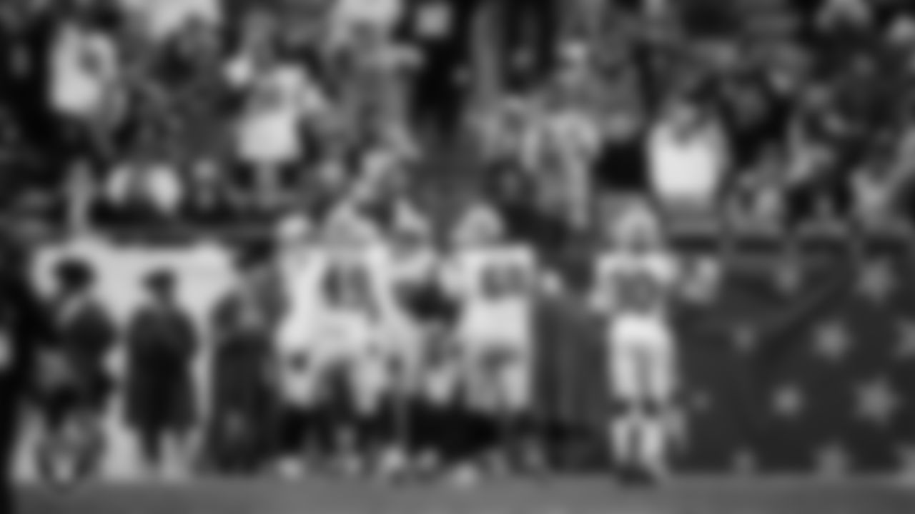 Las Vegas Raiders safety Isaiah Pola-Mao (20) celebrates with teammates after intercepting a pass during the regular season away game against the New England Patriots at Gillette Stadium.