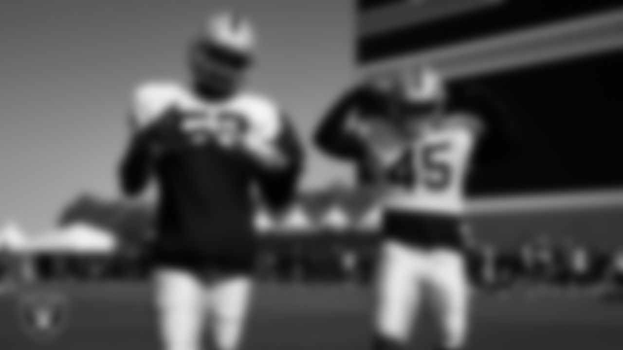 Las Vegas Raiders linebacker Elandon Roberts (52) and linebacker Devin White (45) on the field for a joint practice with the San Francisco 49ers at 2025 Training Camp at Intermountain Health Performance Center.