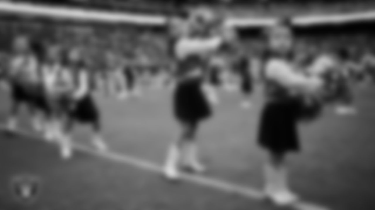 Junior Raiderettes perform on the field before the preseason home game against the San Francisco 49ers at Allegiant Stadium.