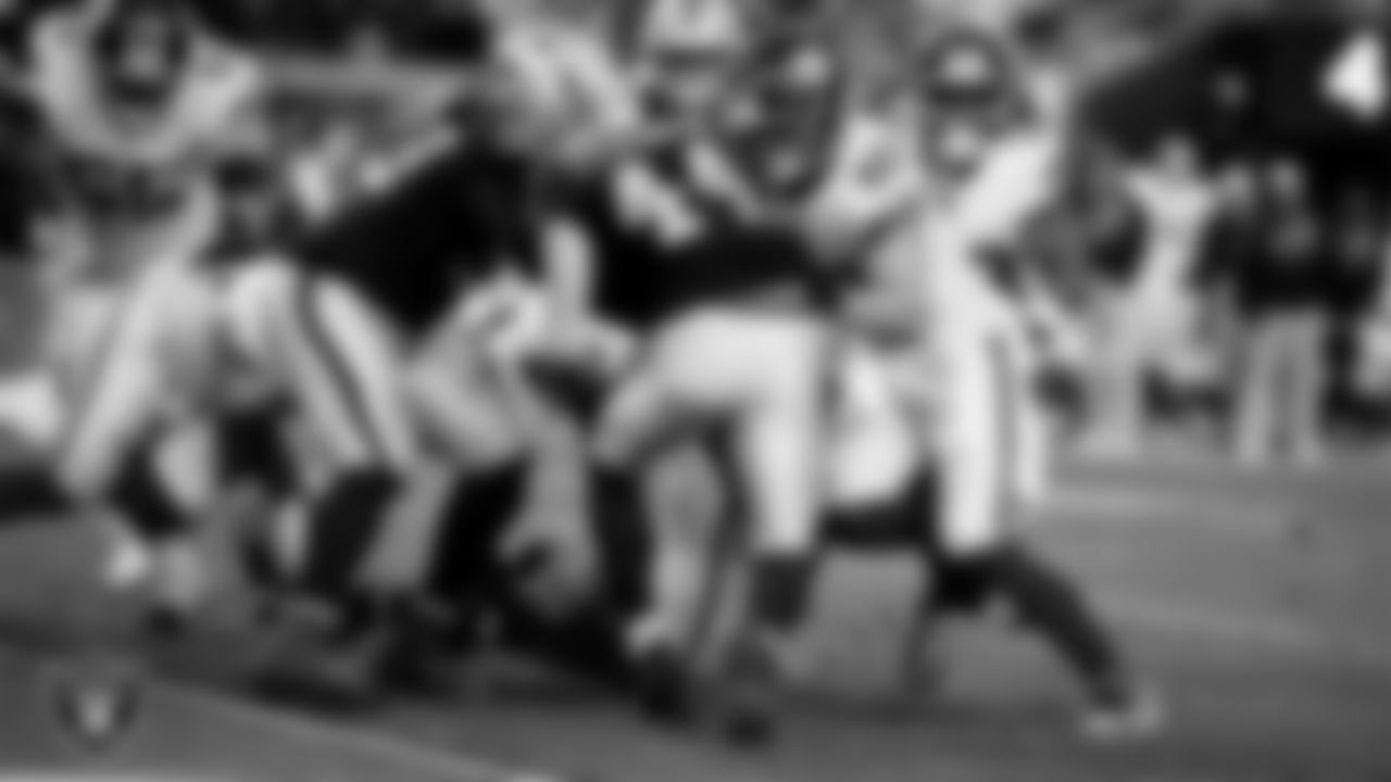 Las Vegas Raiders defensive tackle Tonka Hemingway (97) and linebacker Tommy Eichenberg (44) during the regular season home game against the New York Giants at Allegiant Stadium.