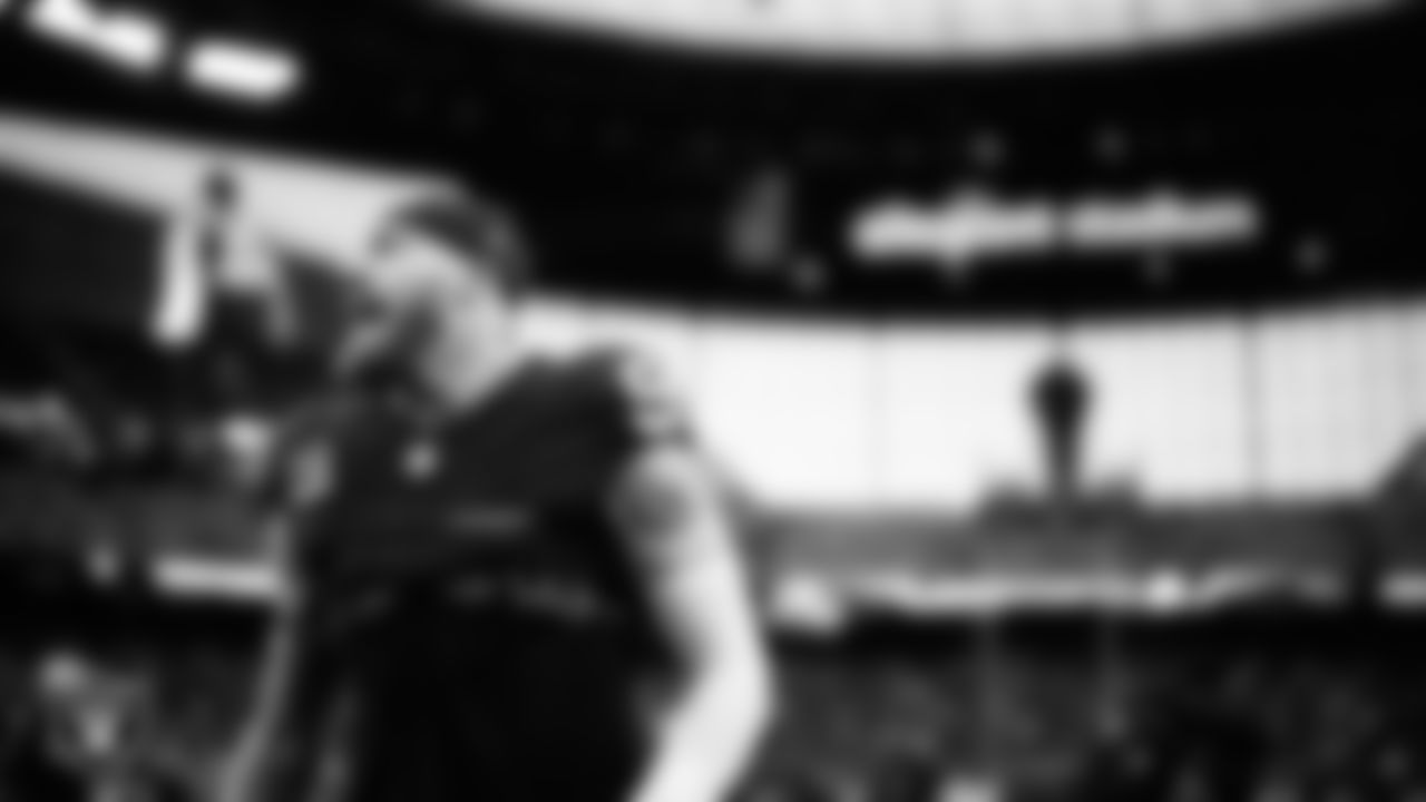 Las Vegas Raiders defensive end Maxx Crosby (98) warming up before the regular season home game against the Denver Broncos at Allegiant Stadium.