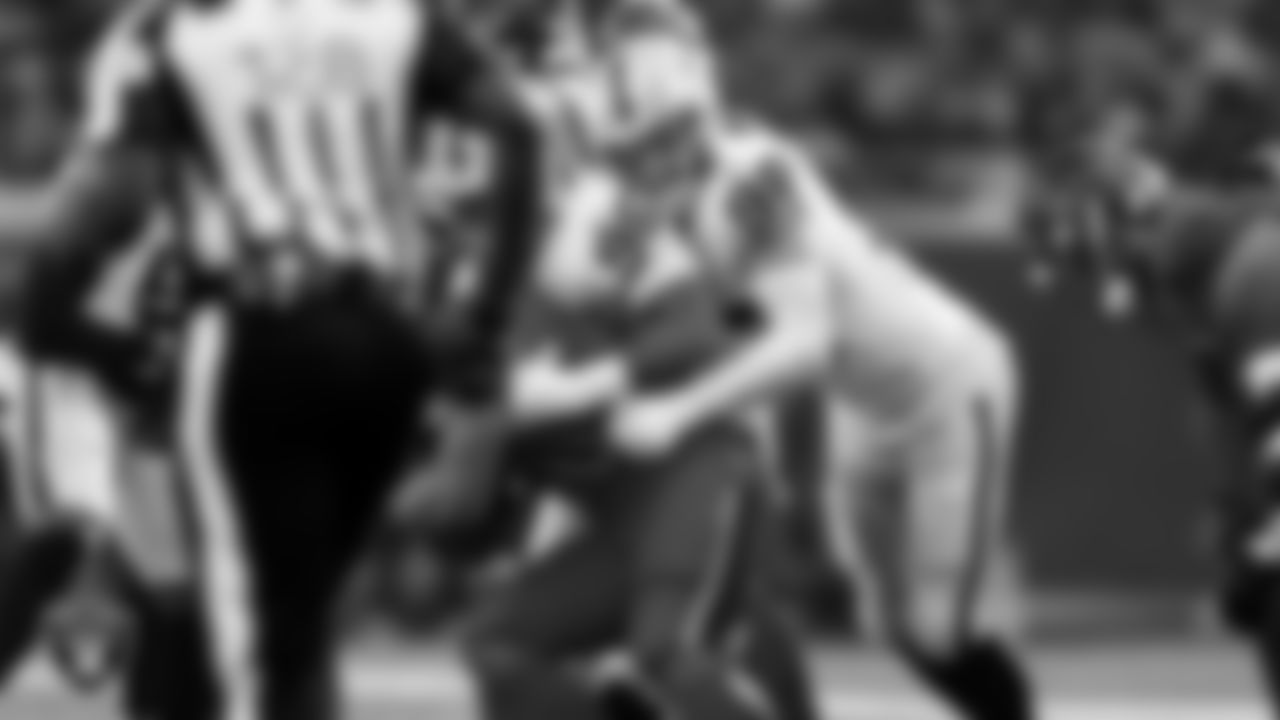 Las Vegas Raiders defensive tackle Jonah Laulu (96) and defensive end Maxx Crosby (98) during the regular season away game against the Houston Texans at NRG Stadium.