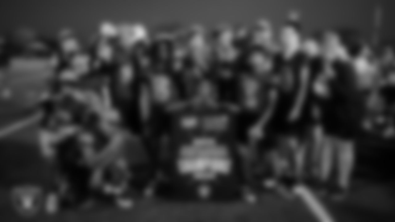 The Carroll M. Johnston STEM Academy boys flag football team poses for a photo after winning a 2025 Middle School Flag Football Championship game at All American Park.