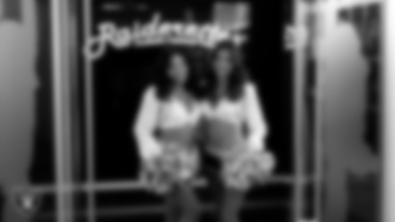 Raiderettes Bria and Reagan in the locker room before the regular season home game against the Los Angeles Chargers at Allegiant Stadium.