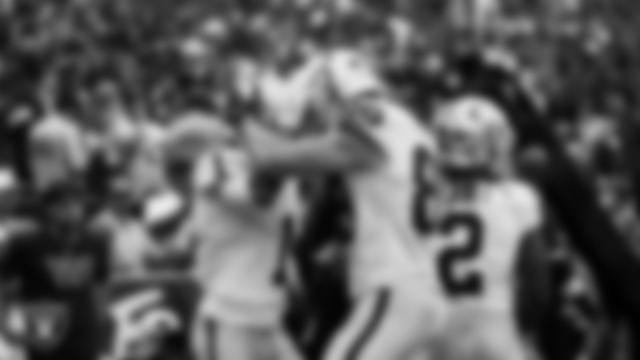 Las Vegas Raiders wide receiver Tre Tucker (1) celebrates with tight end Brock Bowers (89) after making a 10-yard touchdown catch during the regular season away game against the Washington Commanders at Northwest Stadium.