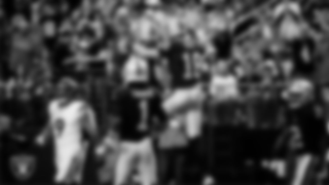 Las Vegas Raiders tight end Brock Bowers (89) celebrates with wide receiver Jack Bech (18) after making a 15-yard touchdown catch during the regular season home game against the Denver Broncos at Allegiant Stadium.