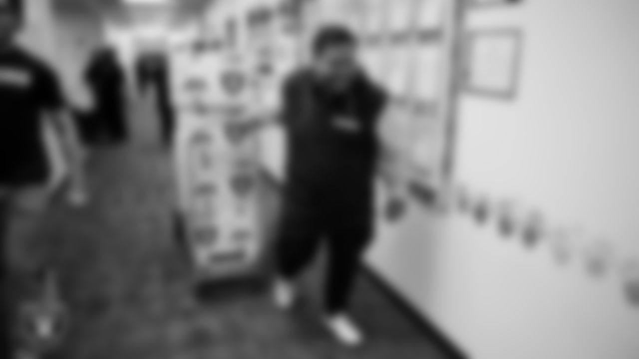 Las Vegas Raiders senior manager of football development Jordan Aguilar delivers classroom gift boxes during a Raiders Spirit Day at Richard H. Bryan Elementary School.