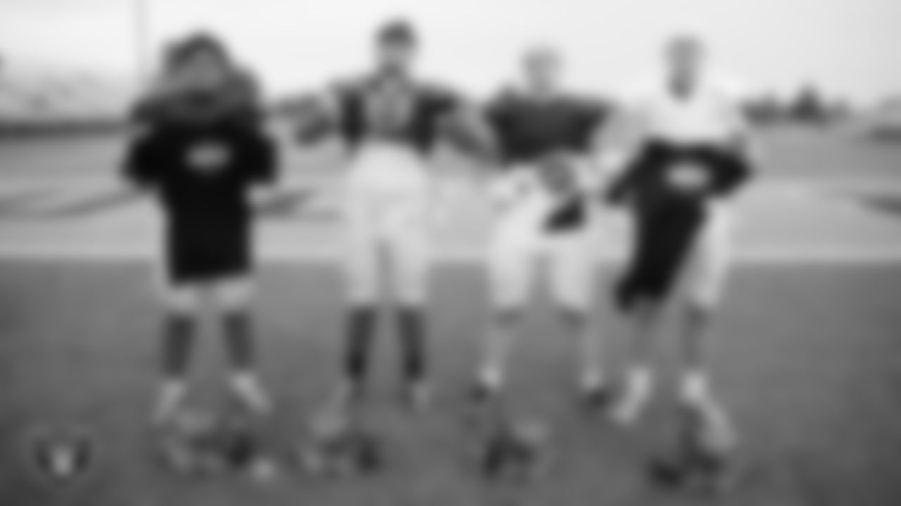 Members of the Eldorado High School football team pose for a photo during practice at Eldorado High School.