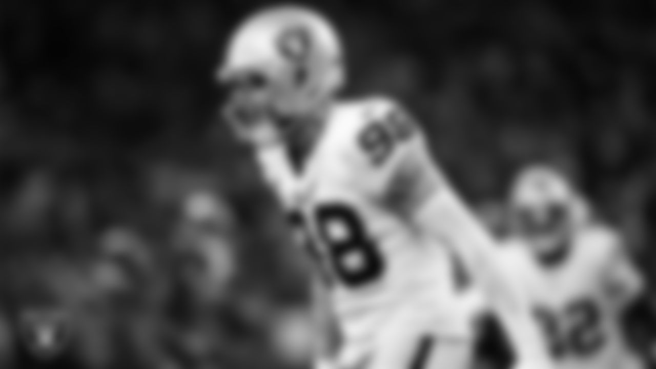 Las Vegas Raiders defensive end Maxx Crosby (98) celebrates after making a tackle during the regular season away game against the Houston Texans at NRG Stadium.