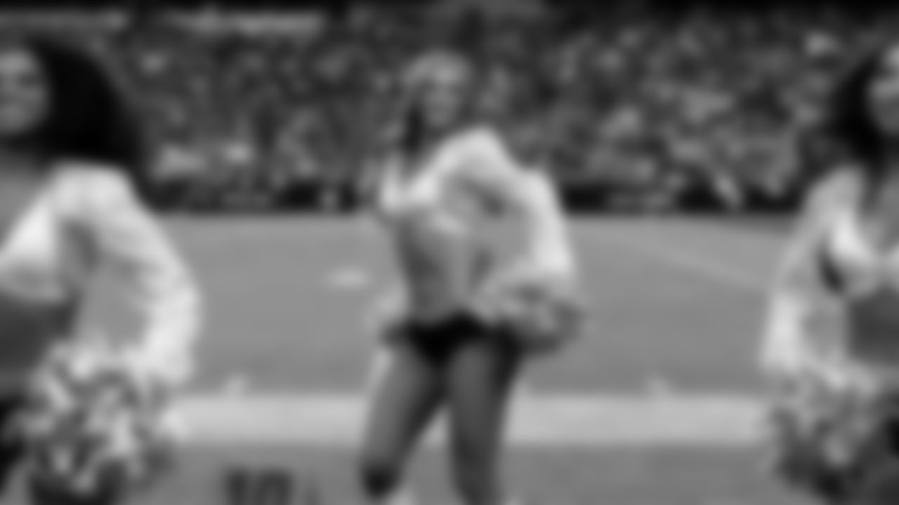 Raiderette Shelby performs on the sidelines during the regular season home game against the Tennessee Titans at Allegiant Stadium.