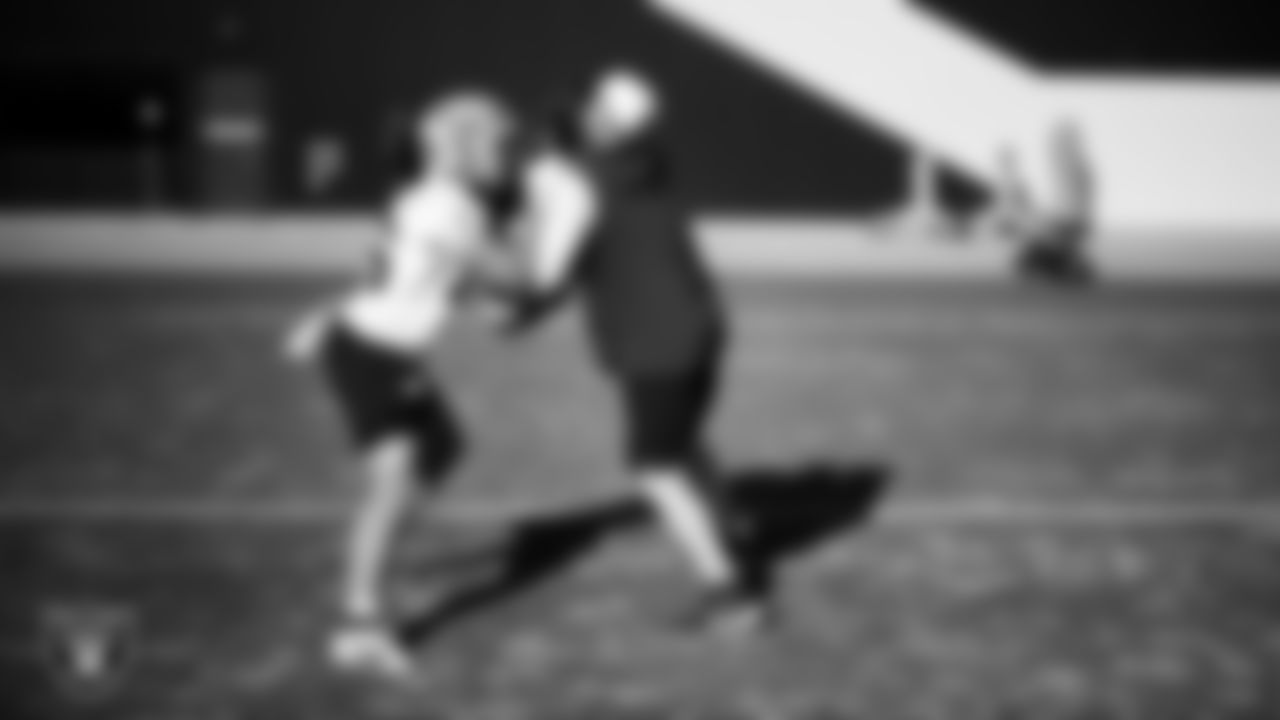 Las Vegas Raiders tight end Albert Okwuegbunam (86) and tight ends coach Luke Steckel during practice at Intermountain Health Performance Center.