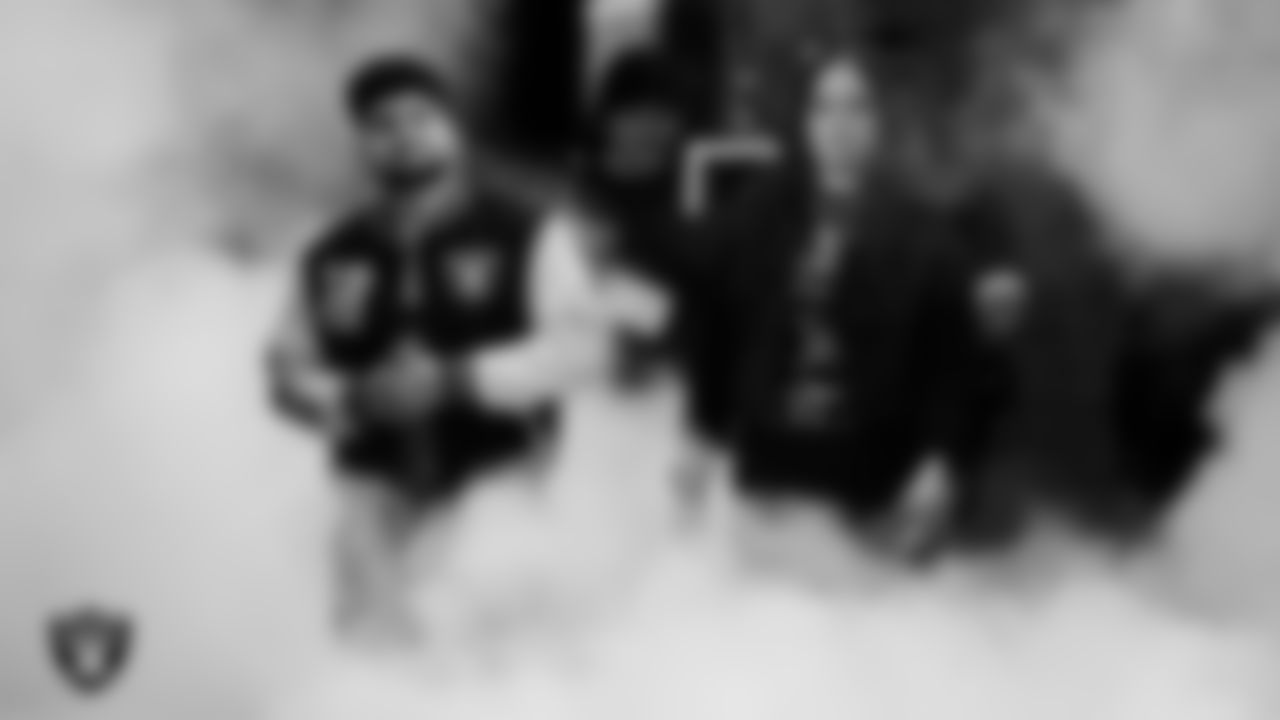 United States Navy veterans Joseph and Maryssa Ortiz are honored during a Salute to Service moment during the Las Vegas Raiders regular season home game against the New York Giants at Allegiant Stadium.