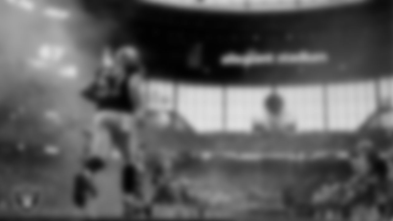 Las Vegas Raiders center Will Putnam (67) is introduced onto the field before the regular season home game against the Cleveland Browns at Allegiant Stadium.