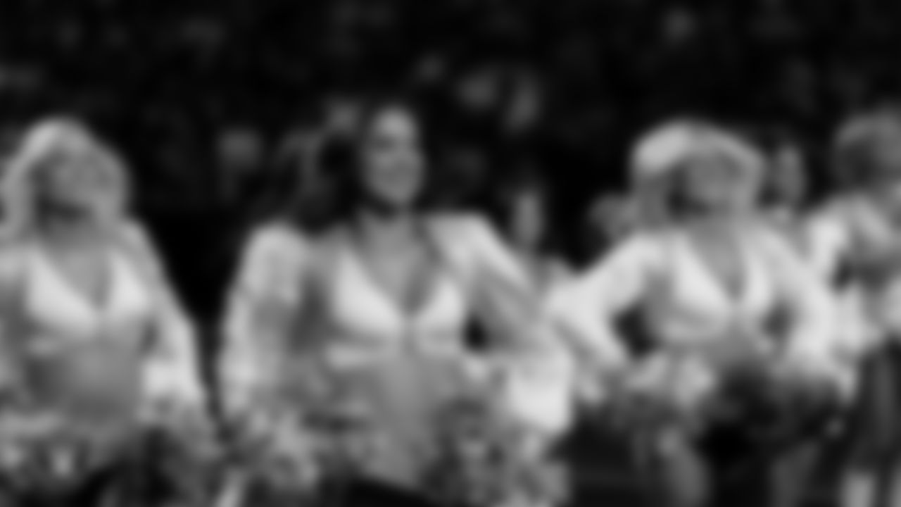 Raiderette Reagan walks onto the field for a performance during the regular season home game against the Denver Broncos at Allegiant Stadium.