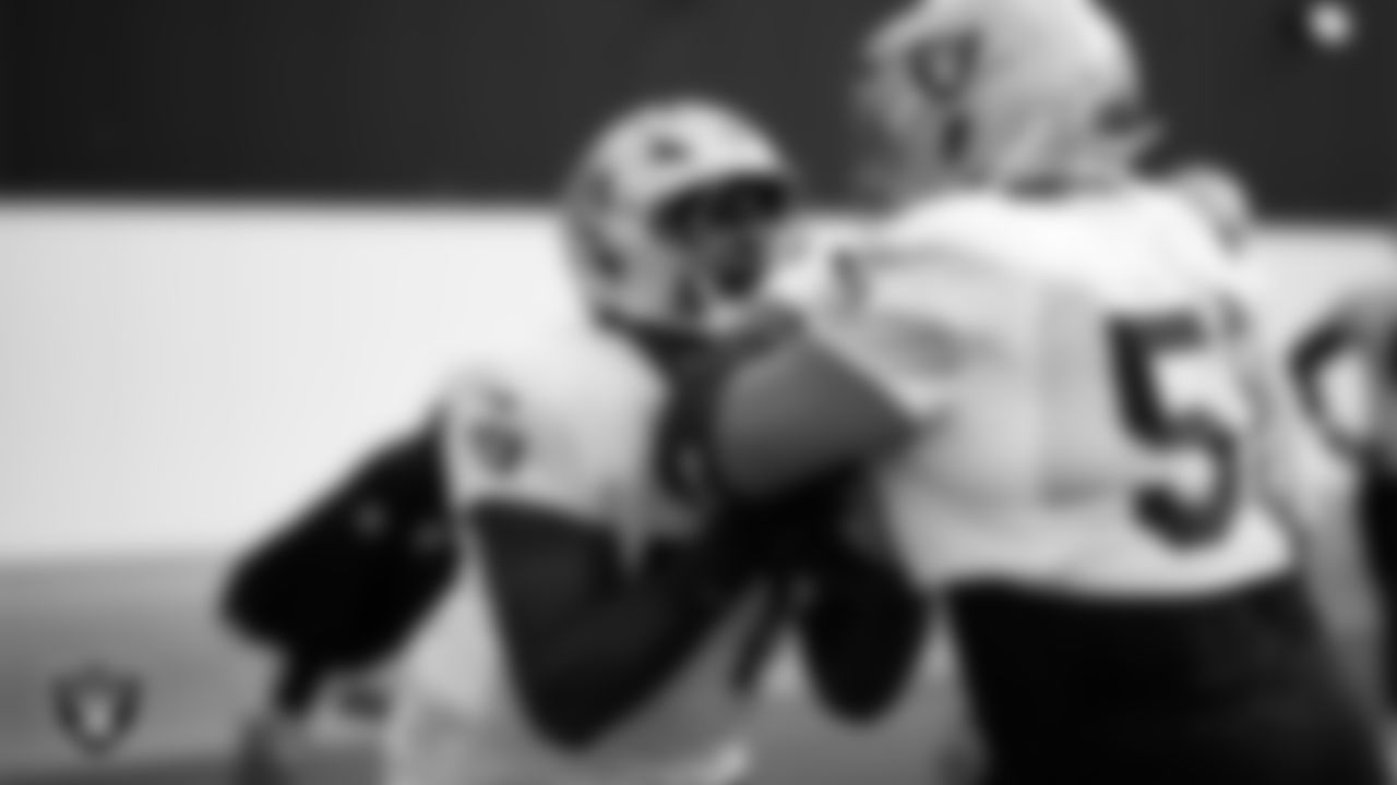 Las Vegas Raiders tackle DJ Glaze (71) and center Jackson Powers-Johnson (58) during practice at Intermountain Health Performance Center.