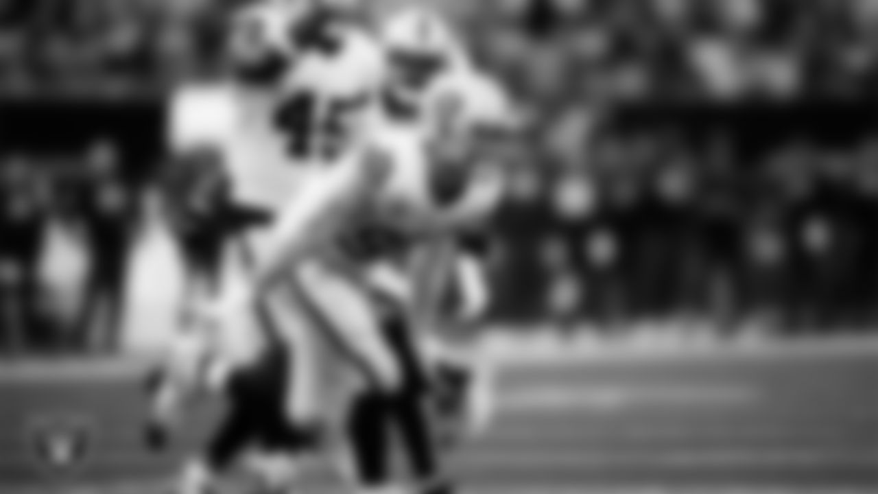 Las Vegas Raiders defensive end Maxx Crosby (98) celebrates after sacking the quarterback during the regular season away game against the Los Angeles Chargers at SoFi Stadium.