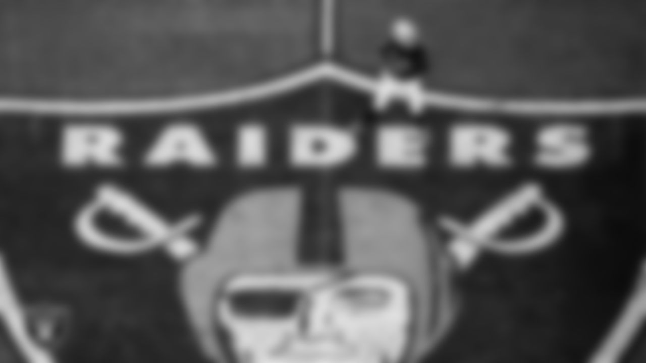 Las Vegas Raiders quarterback Geno Smith (7) looks for a receiver during the regular season home game against the Denver Broncos at Allegiant Stadium.