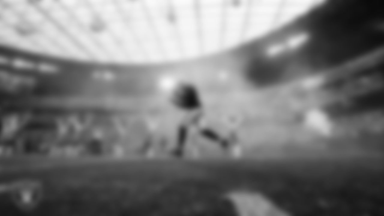 Las Vegas Raiders linebacker Elandon Roberts (52) is introduced onto the field before the regular season home game against the Denver Broncos at Allegiant Stadium.