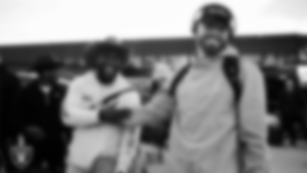 Las Vegas Raiders linebacker Devin White (45) and defensive end Maxx Crosby (98) depart for the regular season away game against the Houston Texans.