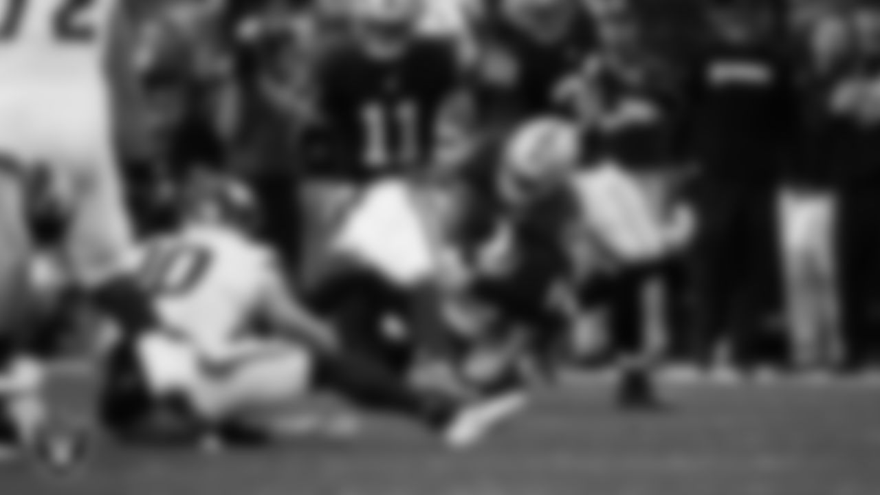 Las Vegas Raiders linebacker Devin White (45) makes a tackle during the regular season home game against the Denver Broncos at Allegiant Stadium.