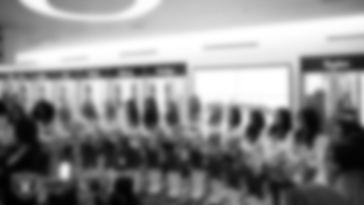 The Raiderettes huddle in the locker room before the regular season home game against the Kansas City Chiefs at Allegiant Stadium.