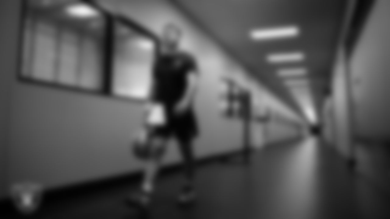Las Vegas Raiders quarterback Cam Miller (5) walks out to the field for practice at Intermountain Health Performance Center.
