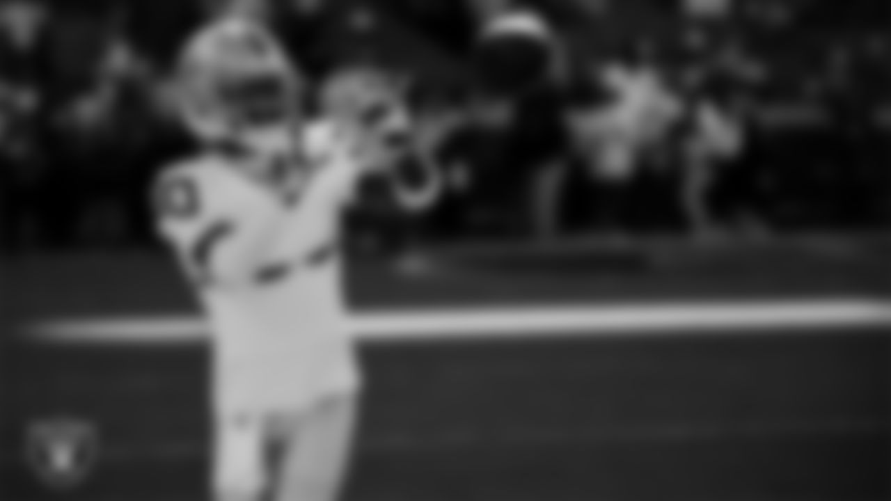 Las Vegas Raiders cornerback Darnay Holmes (30) warming up before the regular season away game against the Kansas City Chiefs at GEHA Field at Arrowhead Stadium.
