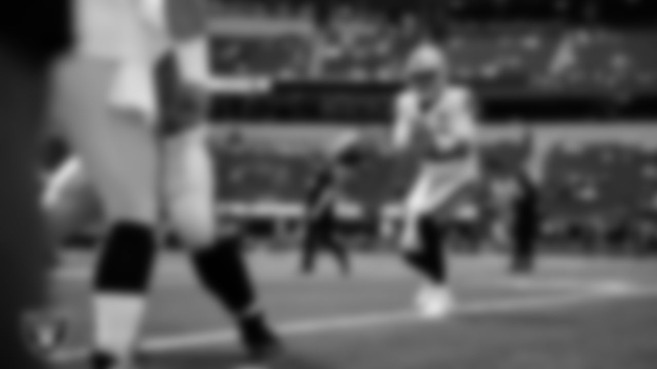 Las Vegas Raiders quarterback Aidan O'Connell (12) warming up before the regular season away game against the Los Angeles Chargers at SoFi Stadium.